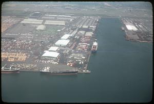 Aerial view of docked ships by freight terminal