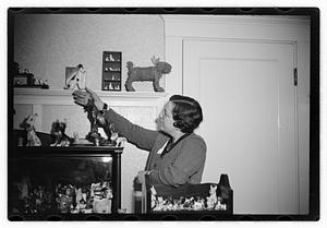 Miss Liddie A Livevey, collector of miniature dogs, 400, 1 live one