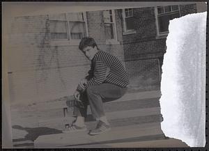 Val sitting on a bench