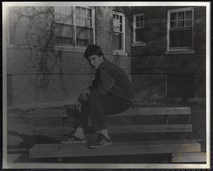 Val Postell sitting on a bench