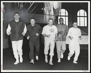 Pre-Spring Training starts for these local major league ball players as they engage in a workout at Tufts cousens Cage with Jumbo baseballcoach Herb Erickson. Left to right, Dick Radatz, Bill Monbouqette, Erickson, Earl Wilson and Frank Malzone.