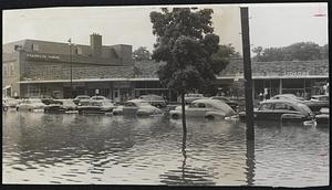 The Gondoliers-One touch of Venice flows past smart shops in Chestnut Hill Shopping Center.