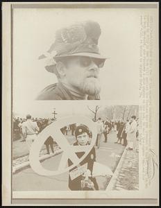 Two of the expected hundreds of thousands of demonstrators expected to rally in New York 4/15 against the Vietnam war are pictured in Central Park. At top is Gary Meinhard, who features a dead pigeon on his hat. He said the pigeon "expired for peace" 4/15. At bottom is Gaylord Chris, 14.