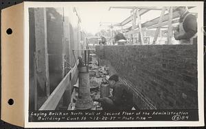 Contract No. 56, Administration Buildings, Main Dam, Belchertown, laying brick on north wall of second floor of the administration building, Belchertown, Mass., Dec. 20, 1937