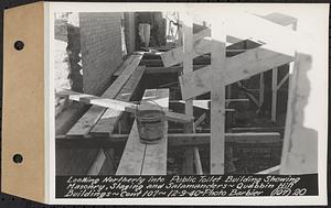 Contract No. 107, Quabbin Hill Recreation Buildings and Road, Ware, looking northerly into public toilet building showing masonry, staging, and salamanders, Ware, Mass., Dec. 9, 1940