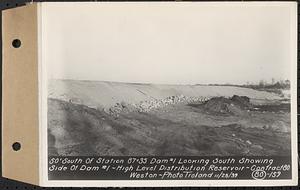 Contract No. 80, High Level Distribution Reservoir, Weston, 50 feet south of Sta. 87+35 dam 1 looking south showing side of dam 1, high level distribution reservoir, Weston, Mass., Nov. 28, 1939