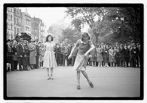 Two young women competing, Boston Common