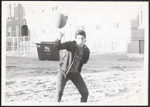 Teen Program, Ariel Colon, spinning a basketball