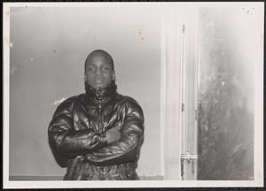Boy posing in a puffy jacket