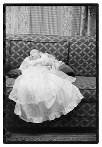 Unidentified baby, possibly in a christening gown