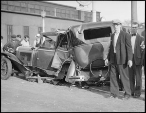 Triple car crash: two autos and street car crash on northern artery at 4th St., East Cambridge. Three injured.