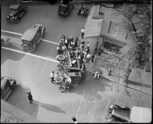 Truck wrecked by bus on Charles St.