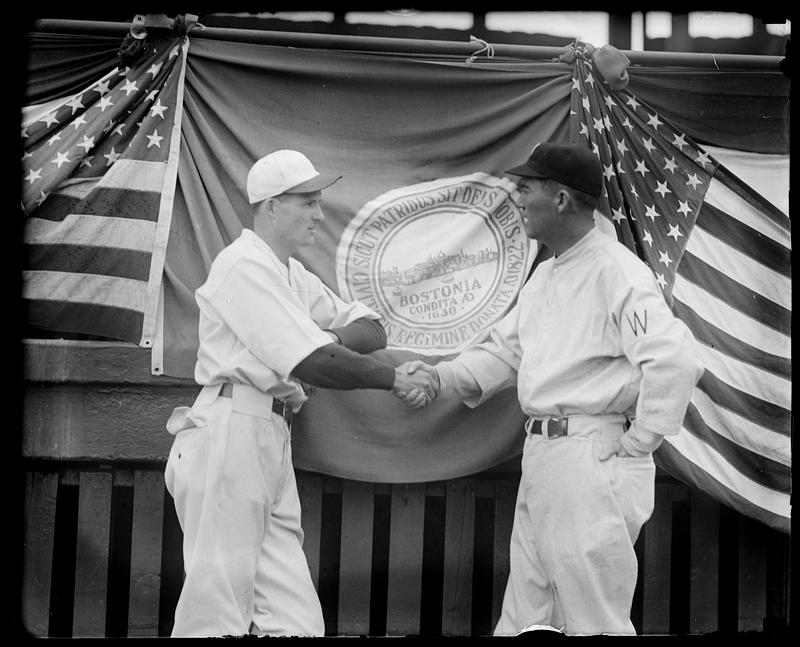 Washington Senator Firpo Marberry shakes hands with Red Sox pitcher Jack Russell