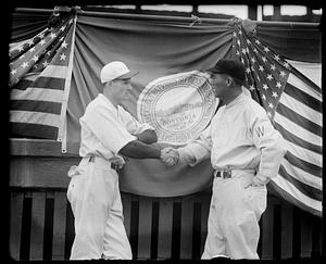 Washington Senator Firpo Marberry shakes hands with Red Sox pitcher Jack Russell