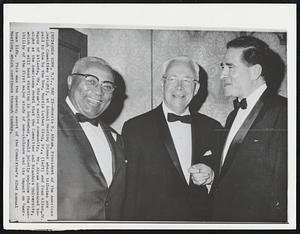 Morris B. Abram, President of the American Jewish Committee (right), at Annual Meeting Dinner where tributes are paid to him by the Rev. Martin Luther King, Sr., (left) and Ivan Allen, Jr. Mayor of Atlanta, Mr. Abram's native community. Mr. Abram announced tonight at the Americana Hotel that the Committee and Brandeis University, which he will head starting in September, would jointly explore the feasibility of the first major study of non-violence and its impact on American life. This was the opening event of the Committee's 62nd Annual Meeting, which continues through Sunday.