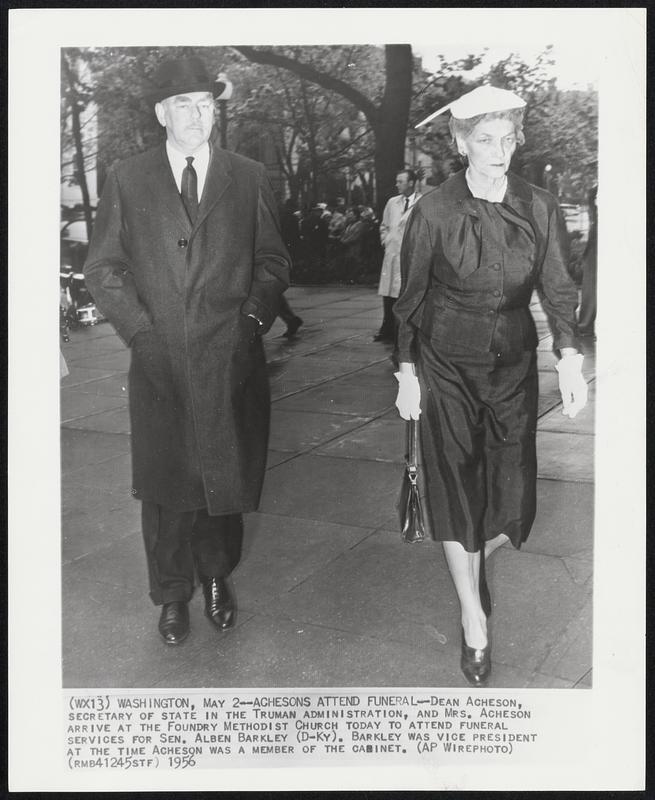 Achesons Attend Funeral-- Dean Acheson, secretary of state in the Truman administration, and Mrs. Acheson arrive at the Foundry Methodist Church today to attend funeral services for Sen. Alben Barkley (D-Ky). Barkley was vice president at the time Acheson was a member of the cabinet.