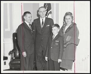 Named Perkins Trustee-Roland M. Achin of Lowell (second left) after swearing in as a trustee of the Perkins School for the Blind by Gov. Volpe (left). Beside the new trustee are his son, Henry, 10, a student at Perkins, and Mrs. Achin. Achin is vice president of the Henry Achin Insurance Agency, Inc., of Lowell, and a son of the late State Rep. Henry Achin.