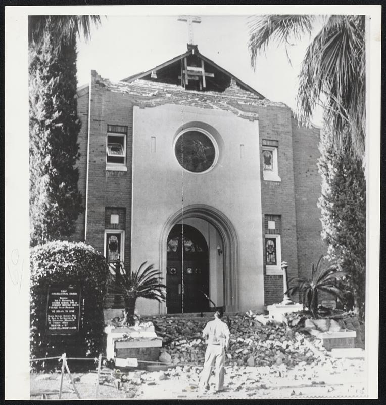 Church Damaged. First Congregational Church damaged by earthquake Friday at Bakersfield, Calif. Cross remains standing and valuable stained glass window above entrance was undamaged.