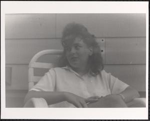 Young woman in a chair
