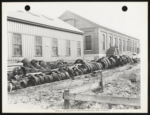 Storage of pulleys at rear of projectile shop