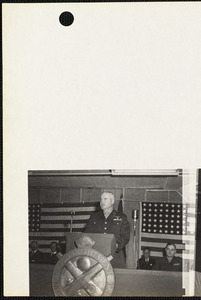 Military officer at podium