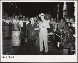 Mechanical worker receiving award