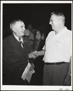 Mechanical worker receiving award