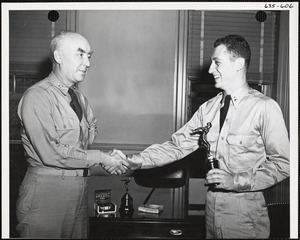 Man receiving trophy