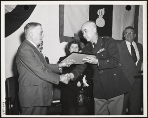 Man receiving award