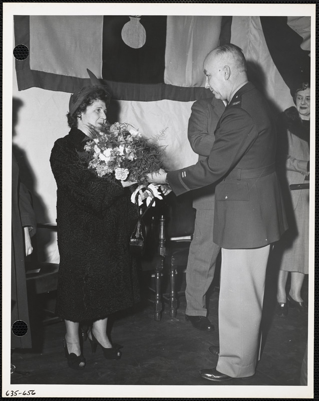 Woman receiving flowers