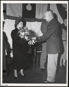 Woman receiving flowers