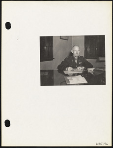 Man signing document