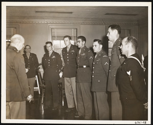 Col. John Mather, Commanding Officer of the Watertown Arsenal, greeting Rangers and Alamo Scouts