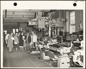 Group looking at machinery