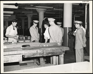 Officers and men inspecting