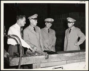 Officers and men inspecting