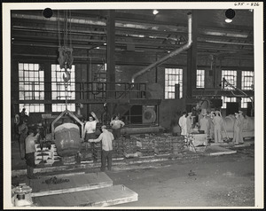 Officers inspecting factory