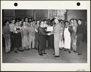 Col. Mesick awarding worker