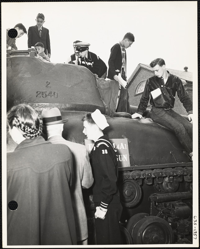 People observing tank