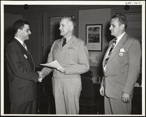 Col. Mesick with two men