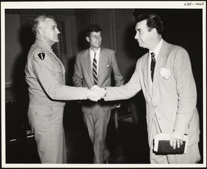 Col. Mesick shaking hands, John F. Kennedy approaching