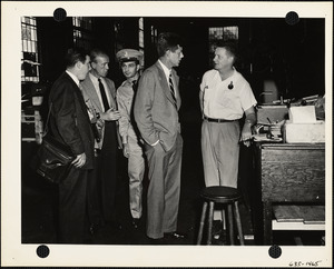 John F. Kennedy with four men