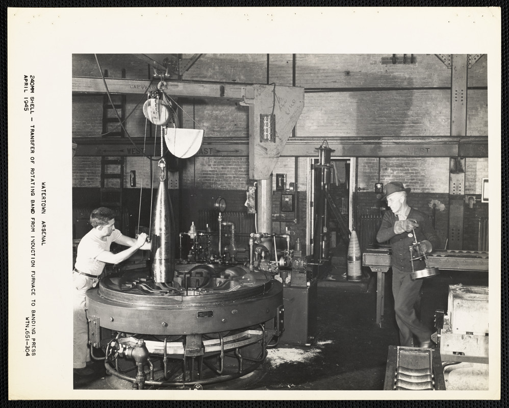 240 MM shell, transfer of rotating band from induction furnace to banding press