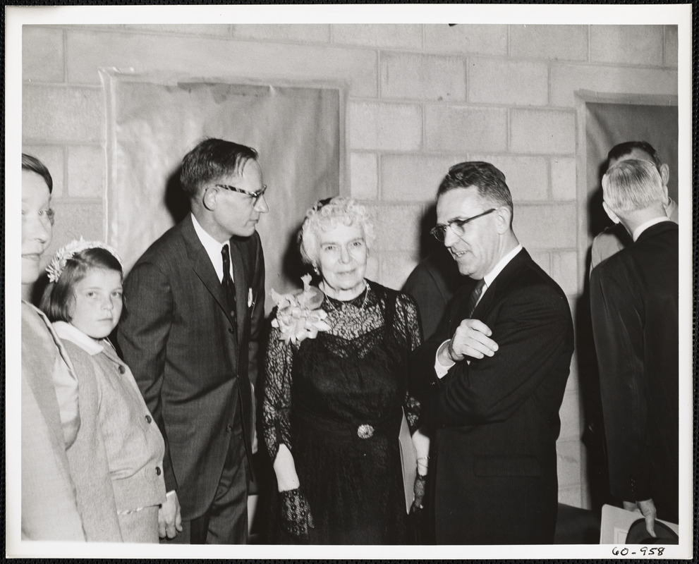 Woman and two men at dedication