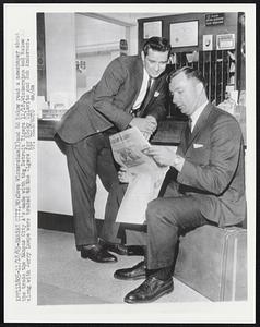Kansas City, Mo: Dave Wickersham (R) and Ed Rakow read a newspaper about the trade the Kansas City A's made with the Detroit Tigers 11/18. Wickersham and Rakow along with Jerry Lumpe were traded to the Tigers for Rocky Colavito and Bob Anderson.