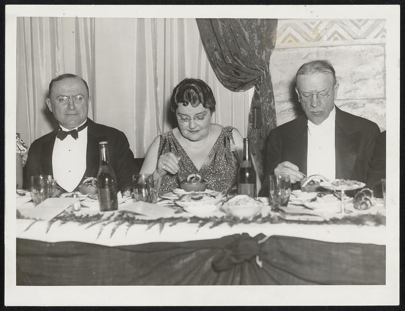 Mayor Frederick W. Mansfield and Mrs. Mansfield, as they attended a reception and dinner given in their honor last night at Dorchester Manor by the ward 14 Mansfield-for-mayor Campaign Committee. The man on the left is Isidore H. Fox, toastmaster.