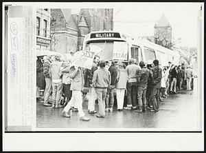 Protesters Stop Army Bus--About 150 demonstrators Thursday prevented an Army bus from taking a bus lead of potential draftees from Selective Service Board to Springfield for pre-induction physicals. The board cancelled the trip.