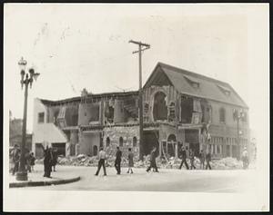 Wide Destruction Wrought by Earthquake -- A Mortuary in the Southern Section of Los Angeles Which Was Wrecked by the Earthquake. This Picture Was Made the Next Day When the Sun Disclosed Scenes of Wide Destruction Throughout the Los Angeles Area. Five People Were Killed in the City of Los Angeles.