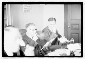 Group of men at table