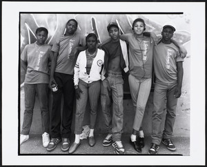 Six young people stand, some wearing shirts that read, "Boston Redevelopment Authority Summer '86"